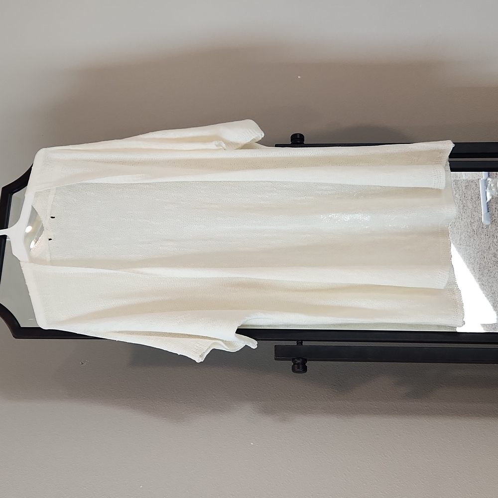 3/4 short sleeve knit cardigan, creamy white color. Knee length (I'm 5'1)